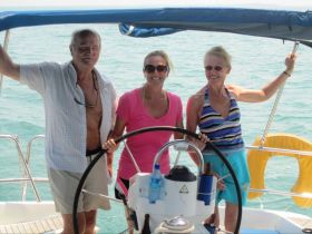 Placencia, Belize expats on a sailboat – Best Places In The World To Retire – International Living
